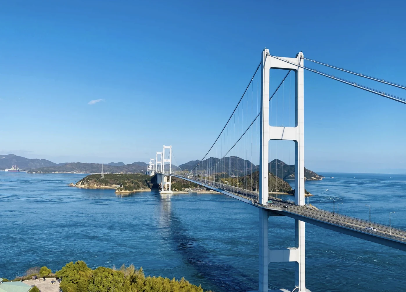 Blue sea and a suspension bridge on the Shimanami Kaido